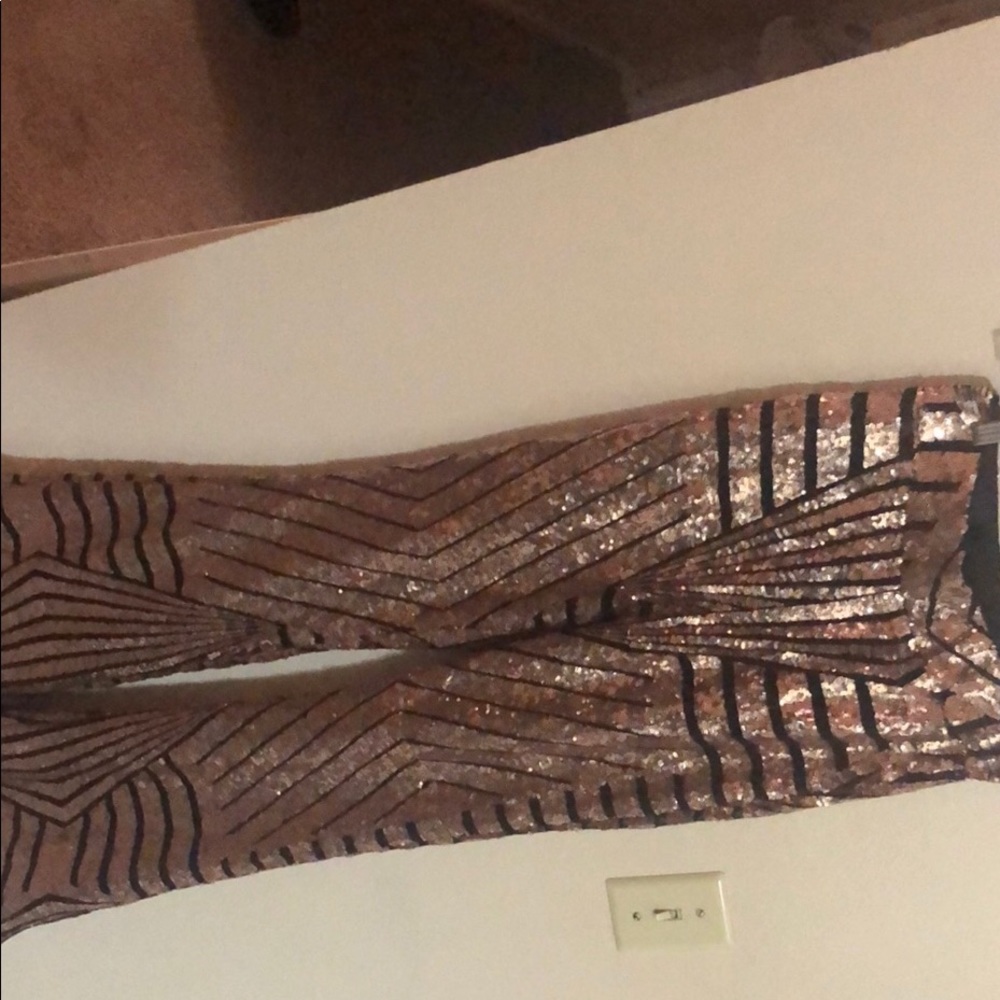 Sparkly gold and black flared pants